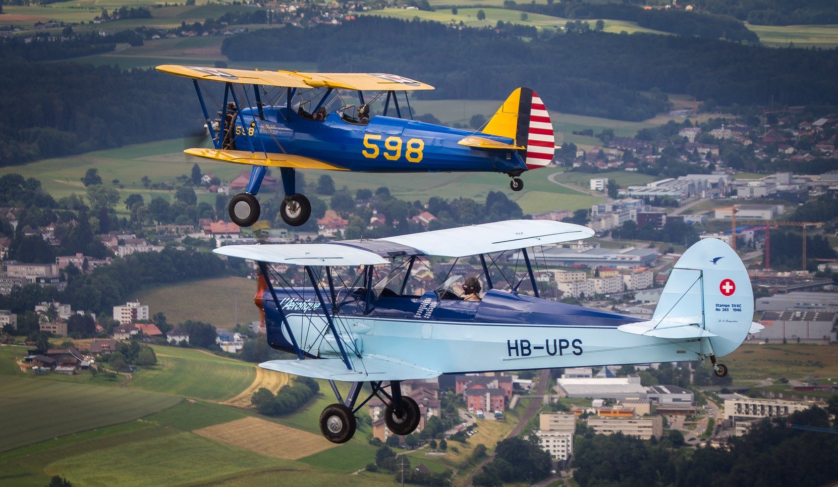 Stearman et Stampe en formation au-dessus de la Gruyère